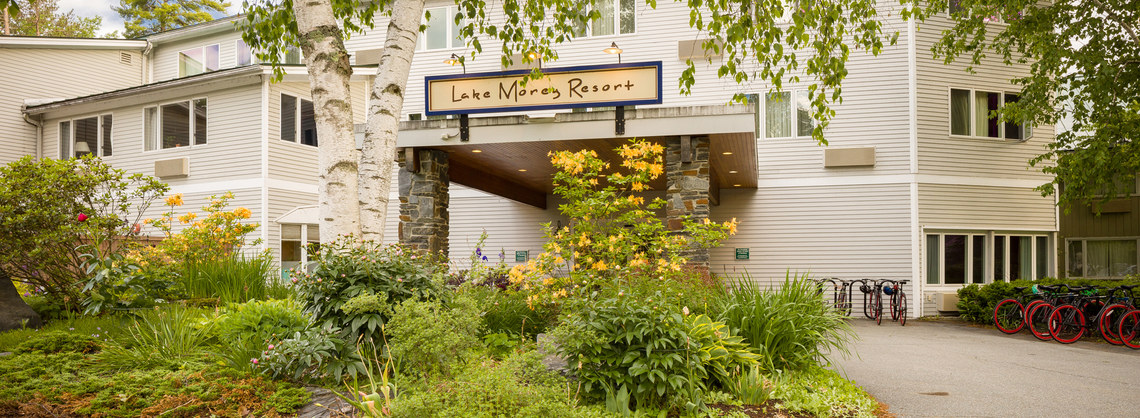 Entrance sign and garden